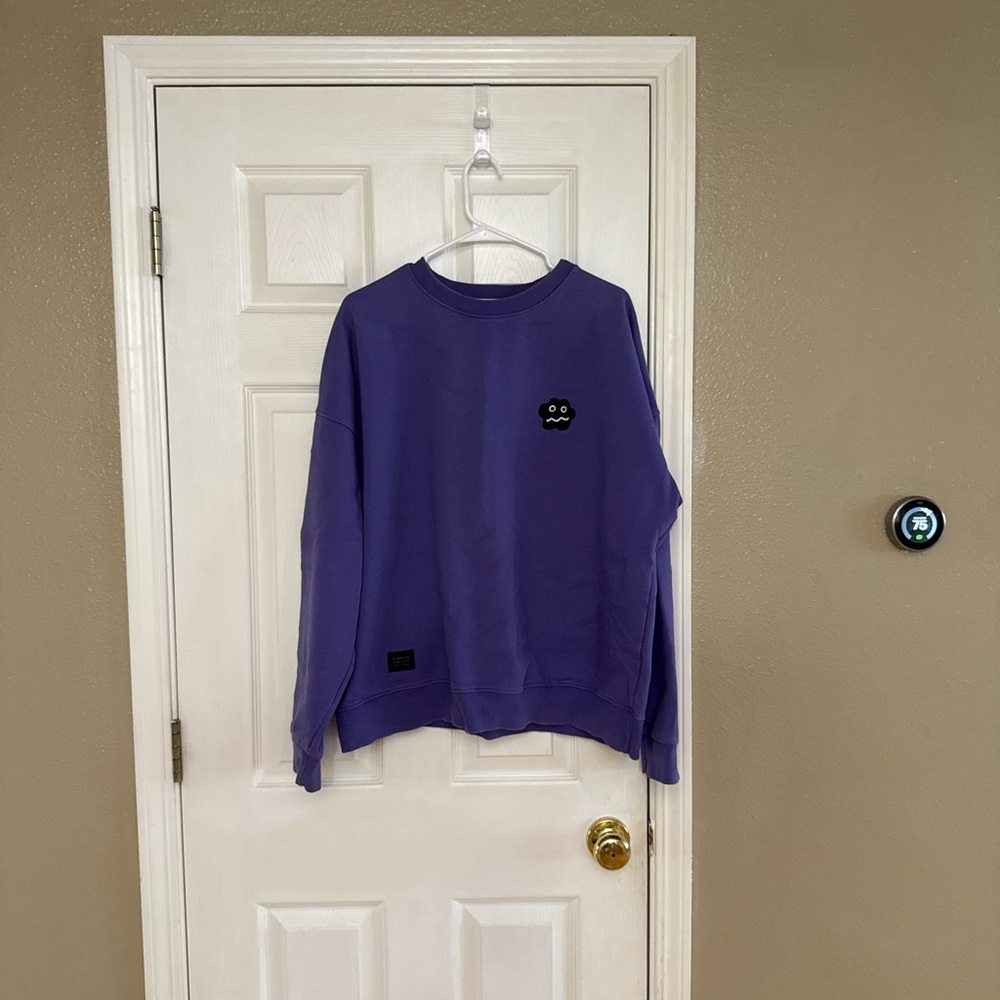 Women's Crewneck Sweatshirt in Purple with Embroidered Patch